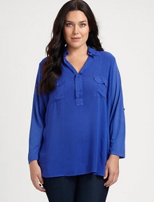 Inspired by the classic blouse, a soft-jersey pullover with a relaxed-yet-feminine fit. Pair this top with slim-fitting pants. Collar neckRoll-tab sleevesPatch pocketsAbout 26 from shoulder to hemRayonMachine washMade in USA