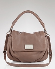 Take your accessories in a punched up direction with MARC BY MARC JACOBS' leather satchel. Take your accessories in a punched up direction with MARC BY MARC JACOBS' leather satchel.