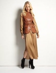 Lengthy, gleaming leather vest has a Mandarin collar, attached belt and plethora of front pockets. Mandarin collar with hook-and-eye closureAsymmetrical zipperAttached beltZippered front slash pockets and flap pocketsSlits at back hemAbout 26 from shoulder to hemFully linedLeatherDry clean with leather specialistImportedModel shown is 5'10 (177cm) wearing US size 2. Lengthy, gleaming leather vest has a Mandarin collar, attached belt and plethora of front pockets. Mandarin collar with hook-and-eye closureAsymmetrical zipperAttached beltZippered front slash pockets and flap pocketsSlits at back hemAbout 26 from shoulder to hemFully linedLeatherDry clean with leather specialistImportedModel shown is 5'10 (177cm) wearing US size 2.