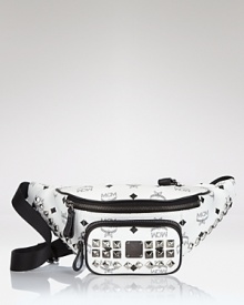 Gleaming studs and logo-splashed leather sets off this cool canvas pack from MCM. Slip this printed piece around your waist for hands free fun. Gleaming studs and logo-splashed leather sets off this cool canvas pack from MCM. Slip this printed piece around your waist for hands free fun.