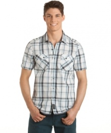 Just kickin' it. Get instant laid-back appeal with this short-sleeved plaid shirt from Calvin Klein Jeans.