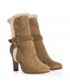 Stay warm and stylish in these chic suede boots from LAutre Chose - Round toe, crisscross ankle strap with buckle, faux shearling lining, chunky heel, side zip closure - Wear with skinny jeans and an oversized pullover or a knit mini-dress and ribbed tights