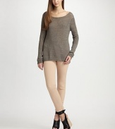 Dropped shoulders and side slits enrich this lengthy linen boatneck. BoatneckLong sleevesRibbed cuffs and hemSide slits at hemLonger length hits below the hipsLinenDry cleanImportedModel shown is 5'9½ (176cm) wearing US size Small.