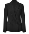 Power business looks get a sharp, sophisticated finish in DKNYs exquisitely tailored jet black blazer - Reverse lapel, long sleeves, double-breasted, flapped front pockets, breast pocket, tailored fit - Pair with pencil skirts and peep-toes