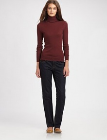 Made from ultra-luxe wool, a ribbed turtleneck with a unique back zipper.TurtleneckLong sleevesBack zipperAbout 24 from shoulder to hemWoolDry cleanImported Model shown is 5'10 (177cm) wearing US size Small. 