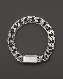 Bold trademark stripes add textural beauty to this sterling silver link bracelet from Gucci. Bold trademark stripes add textural beauty to this sterling silver link bracelet from Gucci.