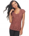 Sheer perfection: INC's short sleeve top, featuring an elegant lace front-- dress it up with trousers or down with denim.