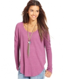 In a stylishly slouchy shape, this Free People thermal top is perfectly paired with all your skinny jeans!