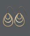 Make a golden statement with these three-tier loop earrings. Crafted in 14k gold, earrings feature three open-cut teardrops, one in smooth gold, and two with texture. Approximate drop: 1/2 inch.