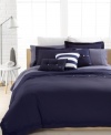 Clean, casual & comfortable. The Solid Peacoat comforter set from Lacoste is essential to any well-dressed bed. Brushed twill fabric and over-sized buttoned accents create a classic, preppy look.