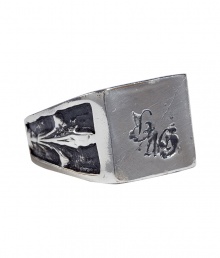 Old-school cool gets a superbly modern twist in Maison Martin Margielas silver signet ring - Blackened accents, textural sides - An edgy signature statement piece Old-school cool gets a superbly modern twist in Maison Martin Margielas silver signet ring - Blackened accents, textural sides - An edgy signature statement piece