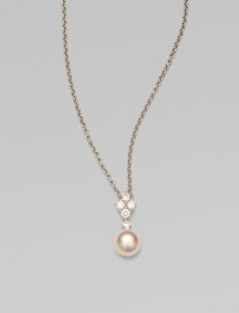 Five dazzling diamonds accent this round Akoya pearl pendant on a sleek 18k white gold link chain. 8MM white, round, Akoya pearlDiamonds, .35 tcwLength, about 18Pendant size, about 1¾ Lobster clasp closureImported Five dazzling diamonds accent this round Akoya pearl pendant on a sleek 18k white gold link chain. 8MM white, round, Akoya pearlDiamonds, .35 tcwLength, about 18Pendant size, about 1¾ Lobster clasp closureImported