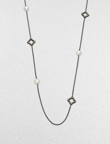 From the Midnight Pearl Collection. This lovely style features diamond accents, quatrefoils and lustrous pearl stations on a sleek, blackened sterling silver box chain. Blackened sterling silverWhite cultured South Sea pearlsDiamonds, .6 tcwLength, about 40Toggle closureImported From the Midnight Pearl Collection. This lovely style features diamond accents, quatrefoils and lustrous pearl stations on a sleek, blackened sterling silver box chain. Blackened sterling silverWhite cultured South Sea pearlsDiamonds, .6 tcwLength, about 40Toggle closureImported
