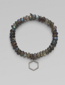 This labradorite beaded, stretch design is accented with a diamond embellished rhodium hexagon charm for a sleek look. Labradorite beadsRhodiumDiamonds, .16 tcwLength, about 6¾Elastic slip-on styleMade in USA of imported materials This labradorite beaded, stretch design is accented with a diamond embellished rhodium hexagon charm for a sleek look. Labradorite beadsRhodiumDiamonds, .16 tcwLength, about 6¾Elastic slip-on styleMade in USA of imported materials