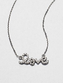 Dazzling diamonds set in dark, black rhodium-plated 14k gold on a link chain. Diamonds, .11 tcwBlack rhodium-plated 14k goldLength, about 16Pendant size, about .66Spring ring closureImported Dazzling diamonds set in dark, black rhodium-plated 14k gold on a link chain. Diamonds, .11 tcwBlack rhodium-plated 14k goldLength, about 16Pendant size, about .66Spring ring closureImported