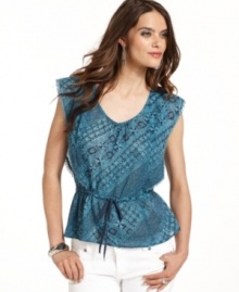 A boho-cool peasant silhouette gets modernized with a graphic, lace-inspired print in this look from DKNY Jeans. A boho-cool peasant silhouette gets modernized with a graphic, lace-inspired print in this look from DKNY Jeans.