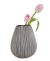 Vertical lines, muted colors and a quirky shape in simple ceramic give the Design Ideas Pinch vase a sense of understated cool.