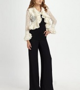 Hand-crocheted, delicately textured Italian wool blend, surrounded by cascading ruffles. Ruffled open frontLong sleevesRuffled cuffs and hem46% wool/25% mohair/18% nylon/11% cashmereDry cleanImported of Italian fabric