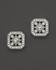 Diamonds set in 14K. white gold recall glamorous art deco style.