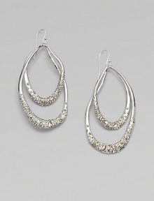 From the Miss Havisham Collection. Long open teardrops of gleaming rhodium plating sparkle with the radiance of Swarovski crystals.CrystalRhodium platingLength, about 2¾Sterling silver ear wireImported