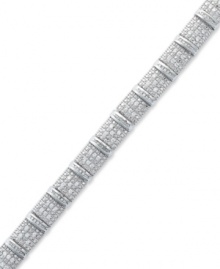 A shimmering statement. This bold sterling silver bracelet sparkles with round and baguette-cut diamonds (2 ct. t.w.) and is sure to leave a lasting impression at any formal affair. Approximate length: 7-1/4 inches. A shimmering statement. This bold sterling silver bracelet sparkles with round and baguette-cut diamonds (2 ct. t.w.) and is sure to leave a lasting impression at any formal affair. Approximate length: 7-1/4 inches.