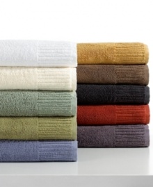 A riveting spectrum of color, the Resort bath sheet from Calvin Klein features fashionable hues set in luxurious Egyptian cotton. Attractive tufted stripes along the hem add subtle dimension. Coordinate with any bath accessories to create an invigorating bathroom retreat.