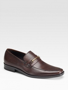 A sophisticated dress style crafted in smooth leather with a goldtone bit detail. Leather lining Leather/rubber sole and heel Imported A sophisticated dress style crafted in smooth leather with a goldtone bit detail. Leather lining Leather/rubber sole and heel Imported