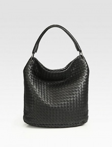 Signature Intrecciato weave of ultra supple nappa lambskin with a slouchy silhouette and smooth oval base.Top handle, 5 drop Magnetic top closure One inside zip pocket One inside cellphone slot Suede lining 14W X 13H X 5D Made in Italy Signature Intrecciato weave of ultra supple nappa lambskin with a slouchy silhouette and smooth oval base.Top handle, 5 drop Magnetic top closure One inside zip pocket One inside cellphone slot Suede lining 14W X 13H X 5D Made in Italy