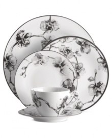 Compose a striking arrangement with the Black Orchid place setting by Michael Aram. Fine white Limoges porcelain flourishes under a dark watercolor motif inspired by foliage from around the world. Compose a striking arrangement with the Black Orchid place setting by Michael Aram. Fine white Limoges porcelain flourishes under a dark watercolor motif inspired by foliage from around the world.