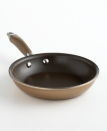The ideal omelette or fry pan, Anolon's stunning skillet lends an impressive air to any kitchen. Crafted in bronze-hued, hard-anodized aluminum with an exclusive nonstick coating, this pan promotes healthier meal preparation done with sumptuous style. Limited lifetime warranty. The ideal omelette or fry pan, Anolon's stunning skillet lends an impressive air to any kitchen. Crafted in bronze-hued, hard-anodized aluminum with an exclusive nonstick coating, this pan promotes healthier meal preparation done with sumptuous style. Limited lifetime warranty.
