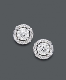 Style fit for a star. Wear this sparkling pair for any occasion, but be prepared to turn heads. Round-cut diamonds (1 ct. t.w.) shine amongst a halo of diamond accents. Crafted in 14k white gold. Approximate diameter: 7-1/2 mm. Style fit for a star. Wear this sparkling pair for any occasion, but be prepared to turn heads. Round-cut diamonds (1 ct. t.w.) shine amongst a halo of diamond accents. Crafted in 14k white gold. Approximate diameter: 7-1/2 mm.