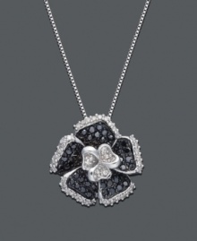 Accentuate your neckline with this bold bloom. Flower pendant features round-cut black diamond (1/3 ct. t.w.) petals with a round-cut white diamond center design and edging (1/5 ct. t.w.). Necklace crafted in sterling silver. Approximate length: 18 inches. Approximate drop: 1 inch. Accentuate your neckline with this bold bloom. Flower pendant features round-cut black diamond (1/3 ct. t.w.) petals with a round-cut white diamond center design and edging (1/5 ct. t.w.). Necklace crafted in sterling silver. Approximate length: 18 inches. Approximate drop: 1 inch.