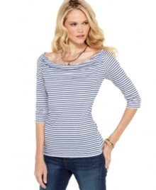 A striped boatneck petite top in a stretchy fabric blend is a flattering classic, from Calvin Klein Jeans. Pair it with jeans or black pants for nautical-inspired style!