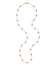 Sweep your neckline with a long, elegant strand. Monet necklace features bronze-colored resin pearls strung on a delicate gold tone mixed metal chain. Approximate length: 32 inches. Sweep your neckline with a long, elegant strand. Monet necklace features bronze-colored resin pearls strung on a delicate gold tone mixed metal chain. Approximate length: 32 inches.