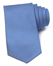A micro basketweave pattern lends a classic look to this luxe silk tie from The Men's Store at Bloomingdale's. A micro basketweave pattern lends a classic look to this luxe silk tie from The Men's Store at Bloomingdale's.