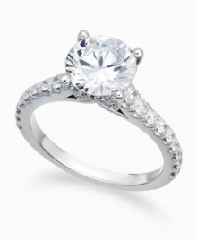 A design that sparkles from every angle. This stunning certified diamond X3 solitaire ring (2 ct. t.w.) features a beautiful round-cut diamond at center, as well as sparkling diamond accents in the sides of the band. Crafted in 18k white gold. A design that sparkles from every angle. This stunning certified diamond X3 solitaire ring (2 ct. t.w.) features a beautiful round-cut diamond at center, as well as sparkling diamond accents in the sides of the band. Crafted in 18k white gold.