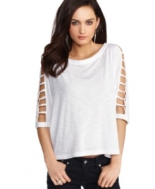 Cutouts add edge to this BCBGeneration top for a hot look that can go from day to night!