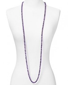 Simple and versatile. This extra-long beaded strand from Carolee adds a dash of color to your neckline, crafted of amethyst stones.