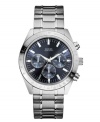 Keeps sports sophisticated with this handsome watch by GUESS.