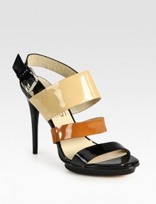 Glassy patent leather straps in a chic colorblock design, finished with an adjustable ankle strap and island platform. Lacquered heel, 4 (100mm)Island platform, 1 (25mm)Compares to a 3 heel (75mm)Patent leather upperLeather lining and solePadded insoleImported