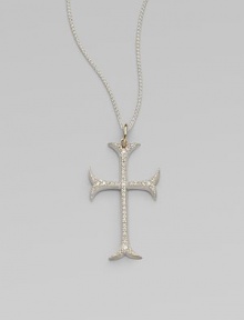 A graceful French Gothic cross sparkles with the dazzle of diamonds set in sterling silver on a woven silver chain with gold accents.Diamonds, .60 tcwSterling silver and 14k yellow goldChain length, about 18Pendant length, about 1½Spring ring claspMade in USA A graceful French Gothic cross sparkles with the dazzle of diamonds set in sterling silver on a woven silver chain with gold accents.Diamonds, .60 tcwSterling silver and 14k yellow goldChain length, about 18Pendant length, about 1½Spring ring claspMade in USA