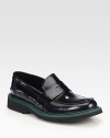 Leather penny loafer design with colored micro detail.Leather upperLeather liningRubber soleMade in Italy