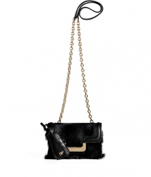A mini version of the must-have Harper silhouette, this Diane von Furstenberg crossbody bag will update your cocktail-ready look - Front flap with magnetic snap closure, back slit pocket with hidden magnetic snap, lip-shaped mirror attached to handle, chain detailed shoulder strap, black leather trim, red interior, inside zippered back wall pocket, back logo detail - Pair with a flirty frock and heels A mini version of the must-have Harper silhouette, this Diane von Furstenberg crossbody bag will update your cocktail-ready look - Front flap with magnetic snap closure, back slit pocket with hidden magnetic snap, lip-shaped mirror attached to handle, chain detailed shoulder strap, black leather trim, red interior, inside zippered back wall pocket, back logo detail - Pair with a flirty frock and heels
