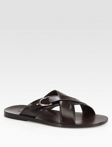 Leather criss-cross slide sandal with silver palladium hardware.Stirrup detailLeather soleMade in Italy Leather criss-cross slide sandal with silver palladium hardware.Stirrup detailLeather soleMade in Italy