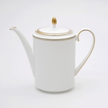 Rings of gold adorn fine white bone china with the lustrous shine of a wedding band. White bone china features two different border trims of gold, a wide corded border of textured grosgrain ribbon on some pieces, a narrow edge on others. Rings of gold adorn fine white bone china with the lustrous shine of a wedding band. White bone china features two different border trims of gold, a wide corded border of textured grosgrain ribbon on some pieces, a narrow edge on others.