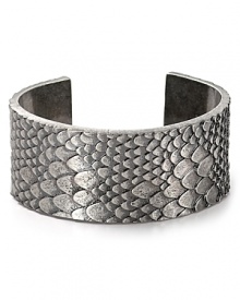 Inspired by reptilian scales, this MARC BY MARC JACOBS cuff flaunts bold texture. Slip on this sinuous showpiece for exotic glamor.