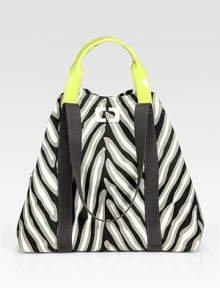 An eclectic print on sturdy canvas defines this roomy carryall, topped with patent leather handles.Leather double top handles, 4½ dropWebbed shoulder straps, 10 dropTop snap closureOne inside snap-button pouchCotton lining8½W X 14¼H X 21½DImported An eclectic print on sturdy canvas defines this roomy carryall, topped with patent leather handles.Leather double top handles, 4½ dropWebbed shoulder straps, 10 dropTop snap closureOne inside snap-button pouchCotton lining8½W X 14¼H X 21½DImported