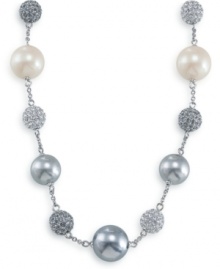 Like a twinkling strand of tinsel, this Carolee necklace will be the perfect trimming. Necklace features white glass pearls, charcoal glass pearls, and sparkling fireballs. Set in silvertone mixed metal. Approximate length: 16 inches + 2-inch extender.