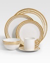 A beautiful dessert plate in fine Limoges porcelain, made entirely by hand and finished with individually-applied 14k gold along the pearl border. From the Perlee Gold Collection Porcelain 8¾ diam. Dishwasher safe Imported 