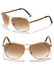It's all in the details. Tod's gorgeous aviators stand out with woven leather arms and sleek double bridge design.